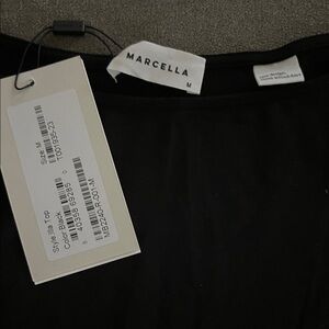 Marcella medium Black long sleeve
